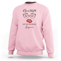 Light pink retirement sweatshirt with 'Retired 2024' and face slogan graphic