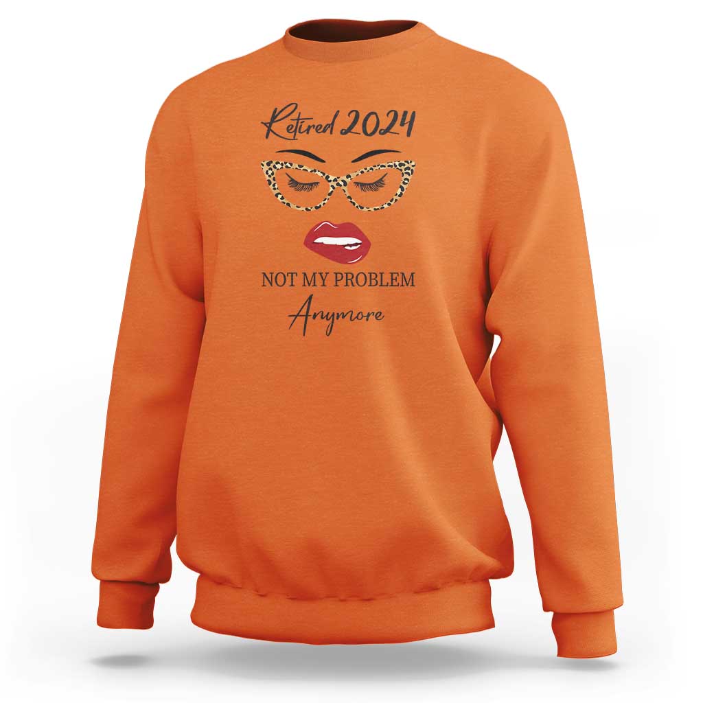 Orange retirement sweatshirt with 'Retired 2024' and face slogan graphic