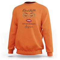 Orange retirement sweatshirt with 'Retired 2024' and face slogan graphic