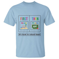 Light blue teacher T-shirt with 'First Then' beach/teach print and 'Back to school time'.