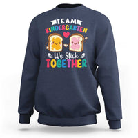 Navy kids sweatshirt with back graphic 'We Stick Together' and 'Team Kindergarten'.