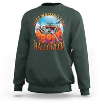 Dark green Halloween sweatshirt with skeleton, pumpkins, and “Halloween” front graphic