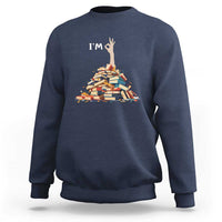 Book lover sweatshirt, navy blue with “I'm” text and stacked books graphic