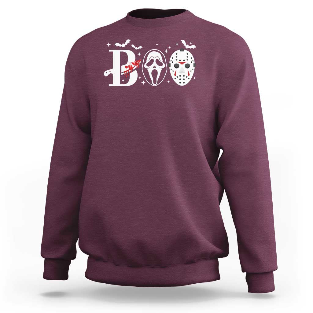 Maroon Halloween sweatshirt with 'B' graphic and three horror masks