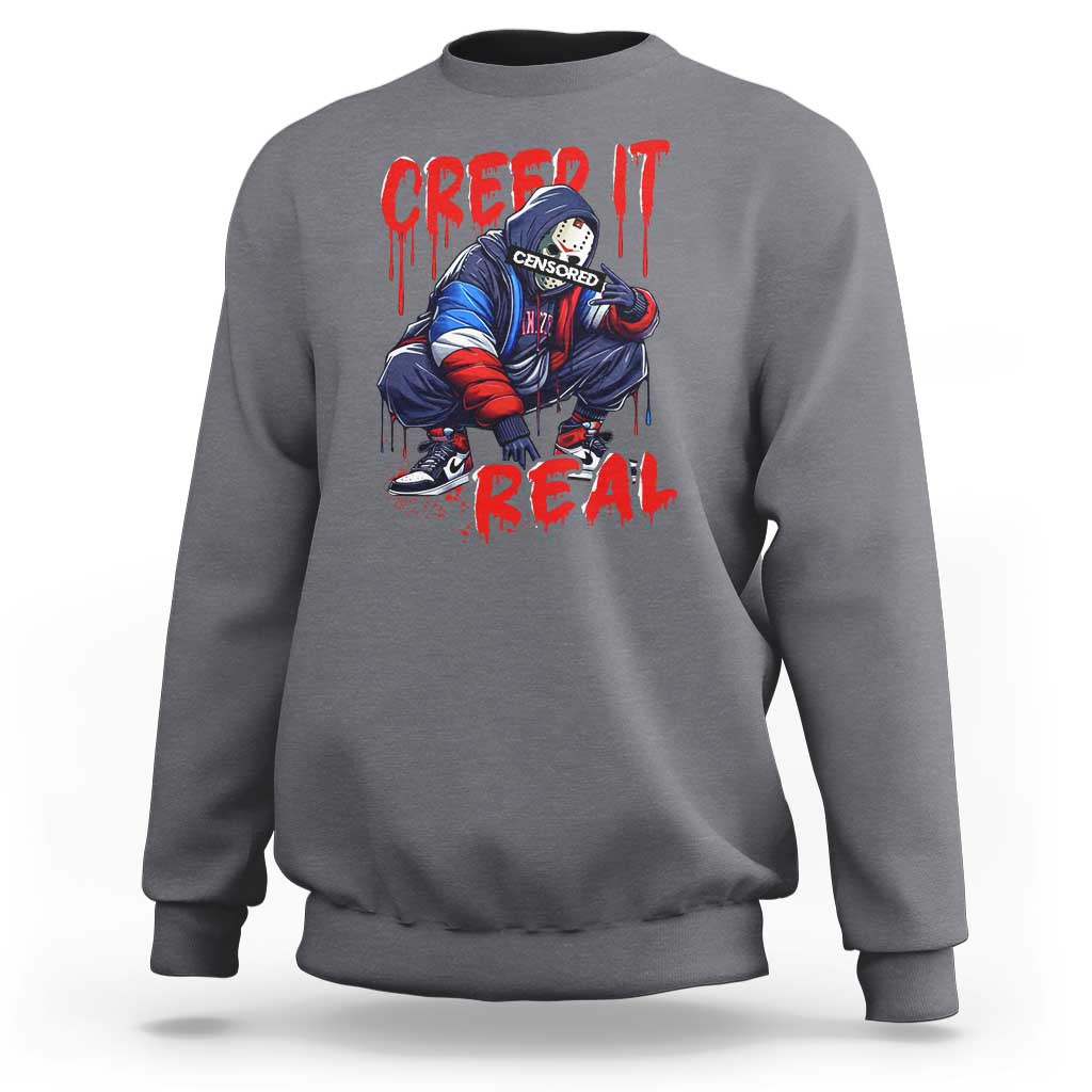 Dark heather Halloween horror sweatshirt with 'Creep It Real' graphic front