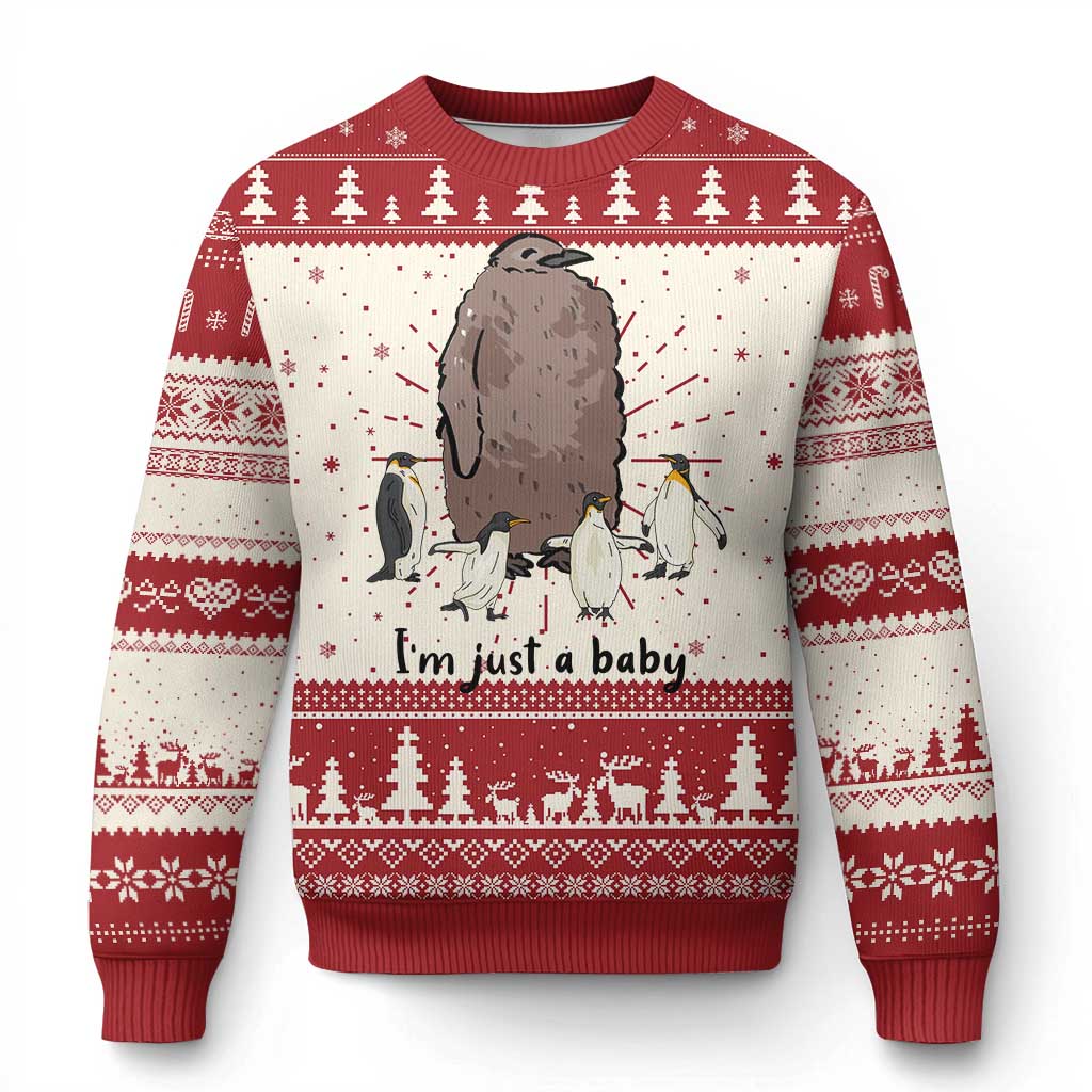 Red ugly Christmas sweater with penguin graphic and 'I'm just a baby' lettering
