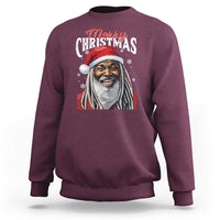 Maroon crewneck sweatshirt with “Merry Christmas” text and Santa portrait graphic