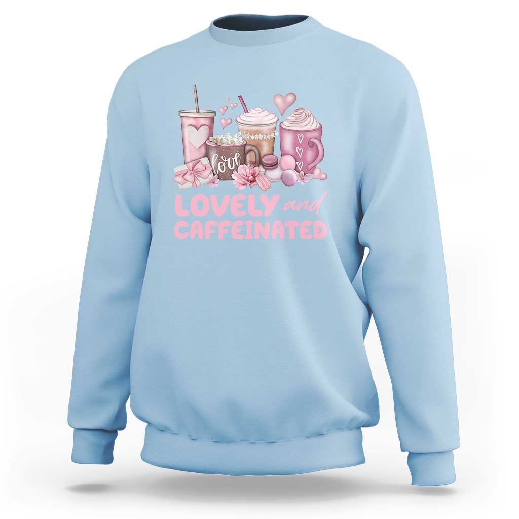 Light blue crewneck sweatshirt with pink coffee and hearts graphic on chest