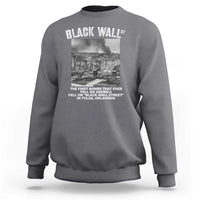 Dark heather gray crewneck sweatshirt with front graphic print and bold chest lettering