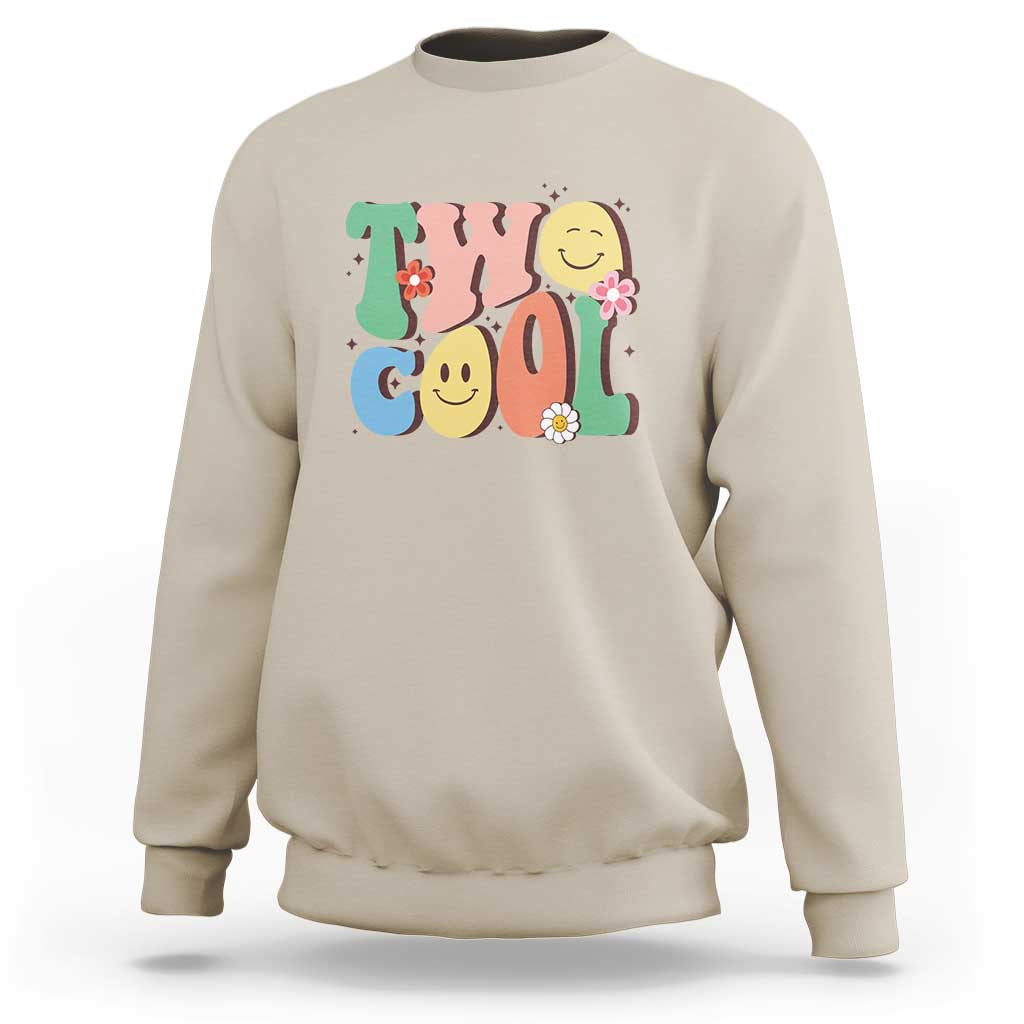 Sand/beige sweatshirt with colorful “2” birthday graphic, flowers, and smiling face