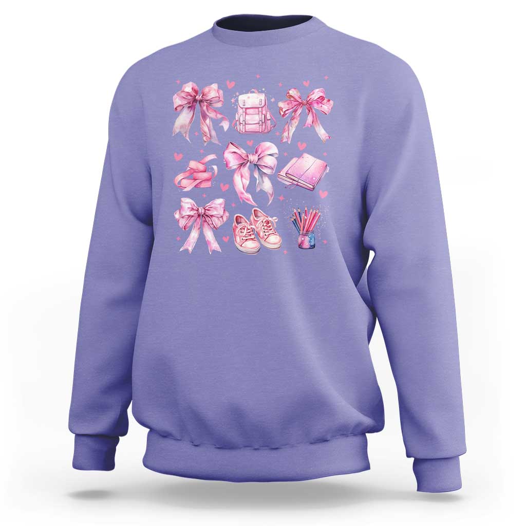 Violet school sweatshirt with pink bow-heart backpack and stationery bows graphic