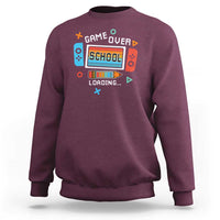 Maroon sweatshirt with game console 'School Loading...' graphic on front