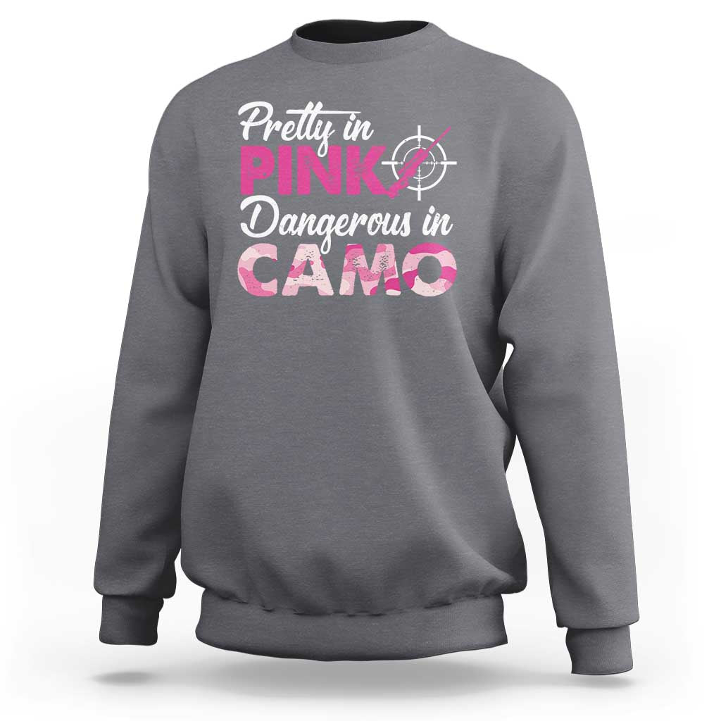 Dark heather gray crewneck sweatshirt with pink camo hunting graphic on front