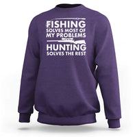 Purple crewneck sweatshirt with white "FISHING" and "HUNTING" quote graphic