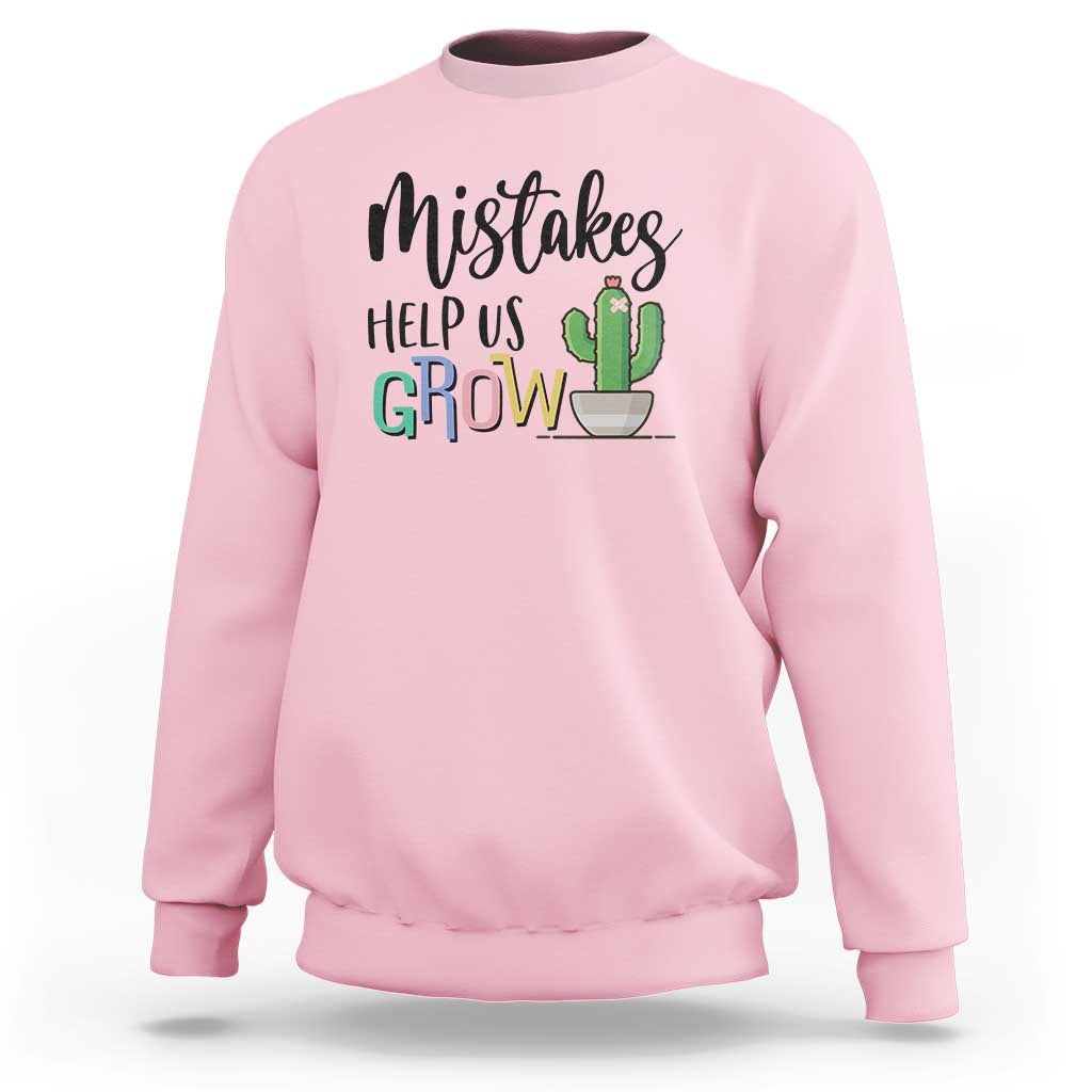 Pink crewneck sweatshirt with front 'Help Us Grow' cactus graphic.