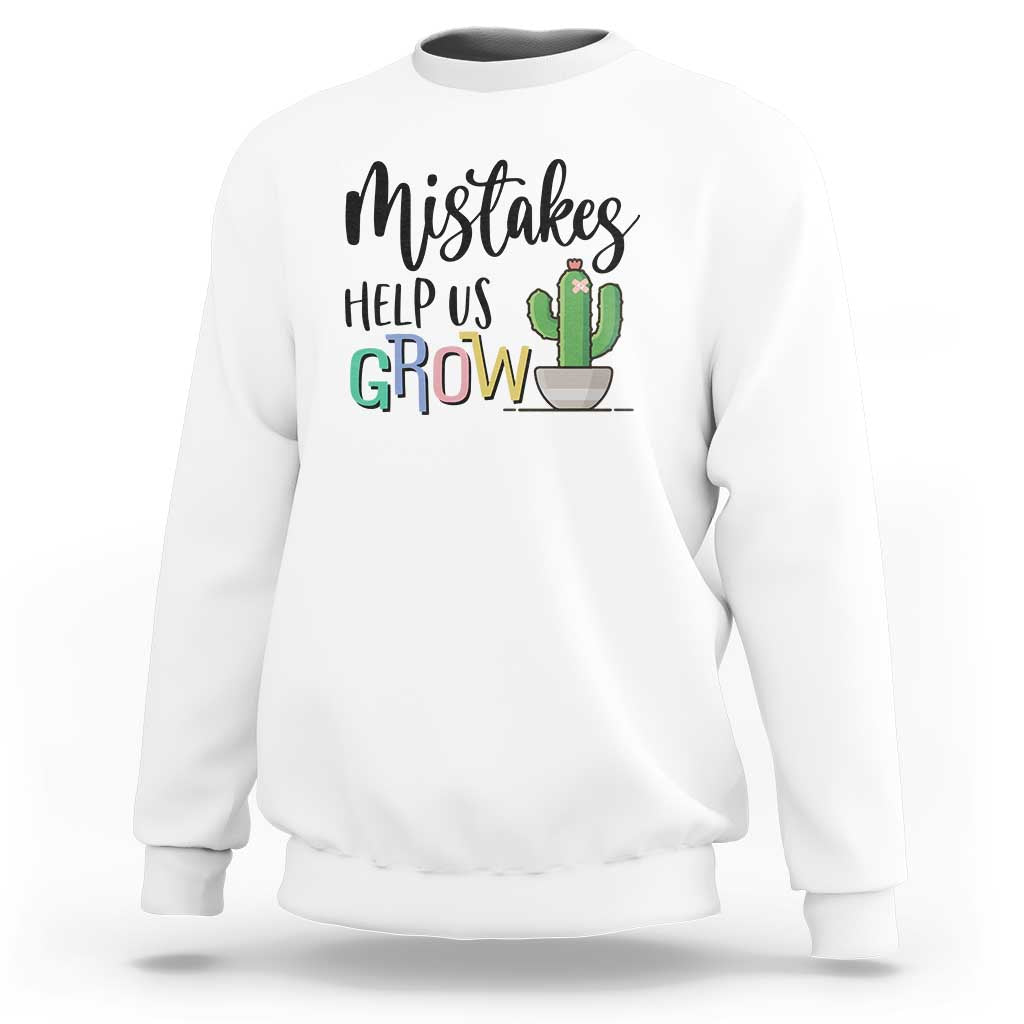 White crewneck sweatshirt with front 'Help Us Grow' cactus graphic.