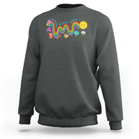 Dark gray sweatshirt with front rainbow wavy graphic and flower chick design