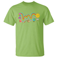 Green t-shirt with colorful rainbow progress education graphic at chest
