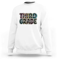 White sweatshirt with "Dream Team Grade" graphic on chest
