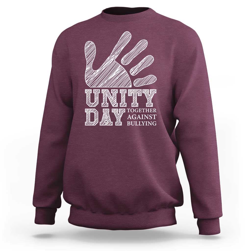 Maroon Unity Day anti-bullying sweatshirt, back view with hand and slogan graphic