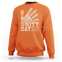 Orange Unity Day anti-bullying sweatshirt, front view with hand and slogan graphic