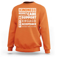 Orange anti-bullying sweatshirt with Kindness Respect Support text graphic on back