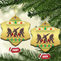 Gold heart holiday ornaments with Bigfoot squad silhouettes and festive sweater design