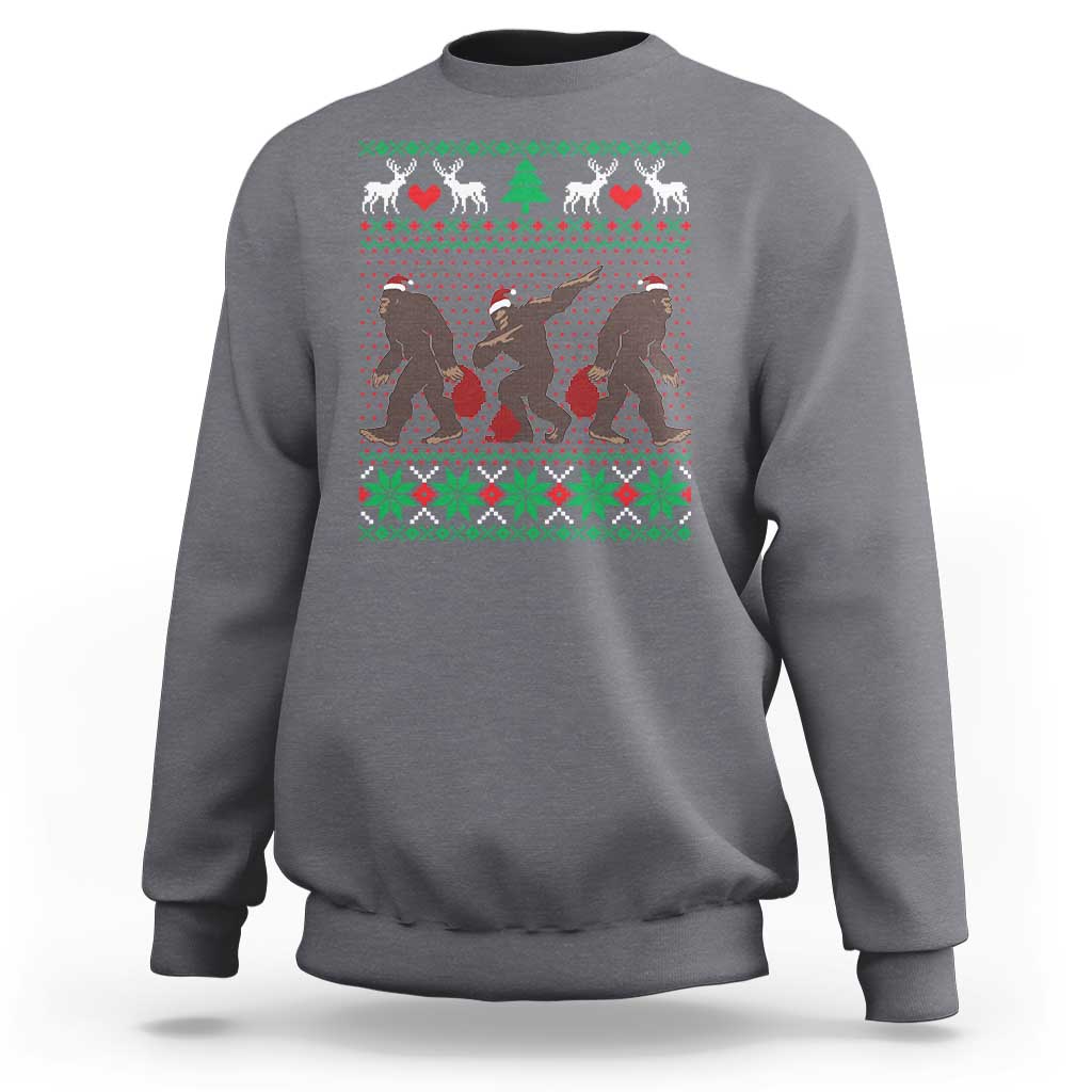 Light gray crewneck sweatshirt with holiday Bigfoot graphic and green red fair isle trim