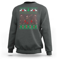 Charcoal gray crewneck sweatshirt with holiday Bigfoot graphic and green red fair isle trim