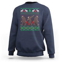 Navy crewneck sweatshirt with holiday Bigfoot graphic and green red fair isle trim
