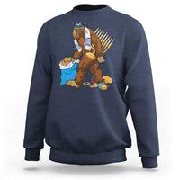 Men's crewneck sweatshirt in navy with Hanukkah Bigfoot menorah graphic