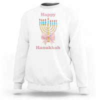 White crewneck sweatshirt with menorah graphic and pink bow at center chest