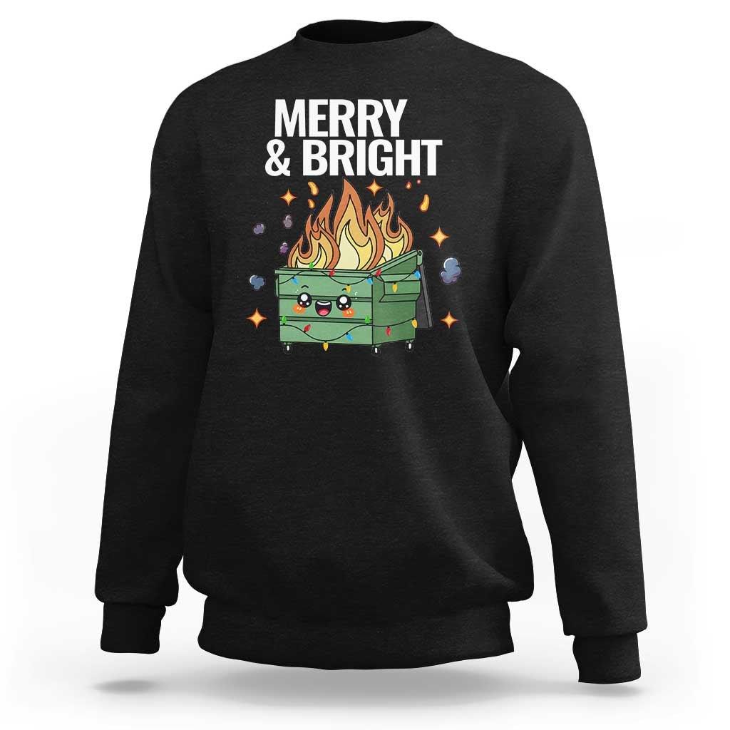 Black crewneck Christmas sweatshirt with “MERRY & BRIGHT” and flaming holiday dumpster graphic