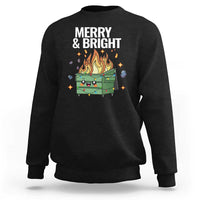 Black crewneck Christmas sweatshirt with “MERRY & BRIGHT” and flaming holiday dumpster graphic