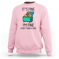 Sweatshirt with cat-and-dumpster graphic and “It's Fine, I'm Fine, Everything Is Fine” text, light pink