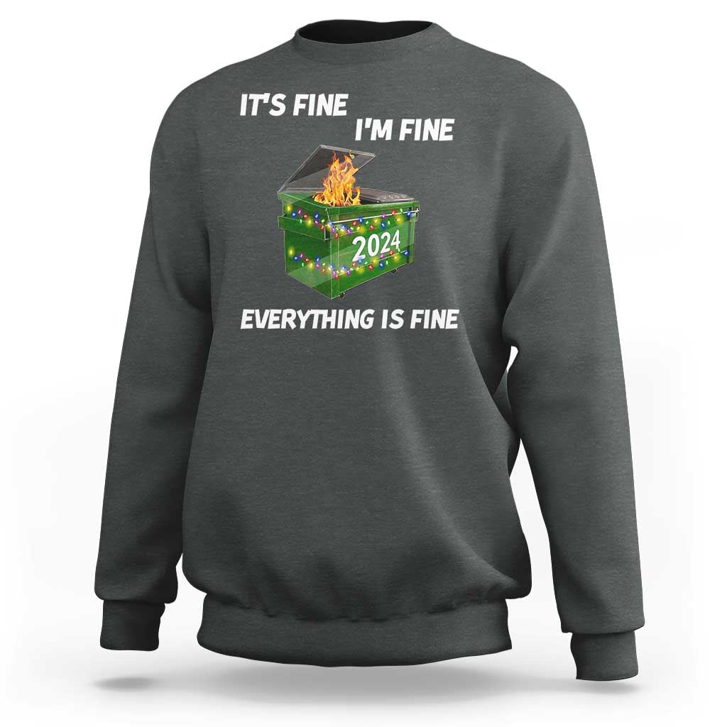 Dark heather holiday sweatshirt with 'It's Fine' text and 2024 dumpster fire graphic