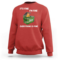 Red holiday sweatshirt with 'It's Fine' text and 2024 dumpster fire graphic