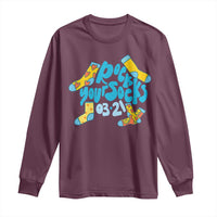 Maroon long sleeve shirt with colorful Your Socks graphic on the chest