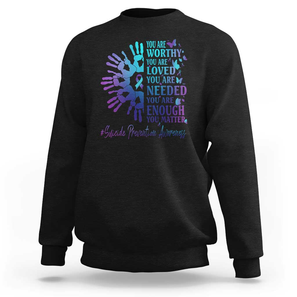 Black crewneck sweatshirt with multicolor handprint graphic and hope text on chest