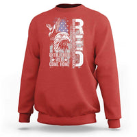Red crewneck sweatshirt with white eagle-and-stars graphic on front