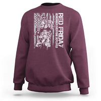Maroon crewneck sweatshirt with patriotic soldier and flag graphic on front