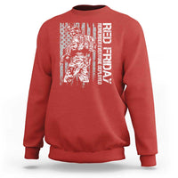 Red crewneck sweatshirt with patriotic soldier and flag graphic on front