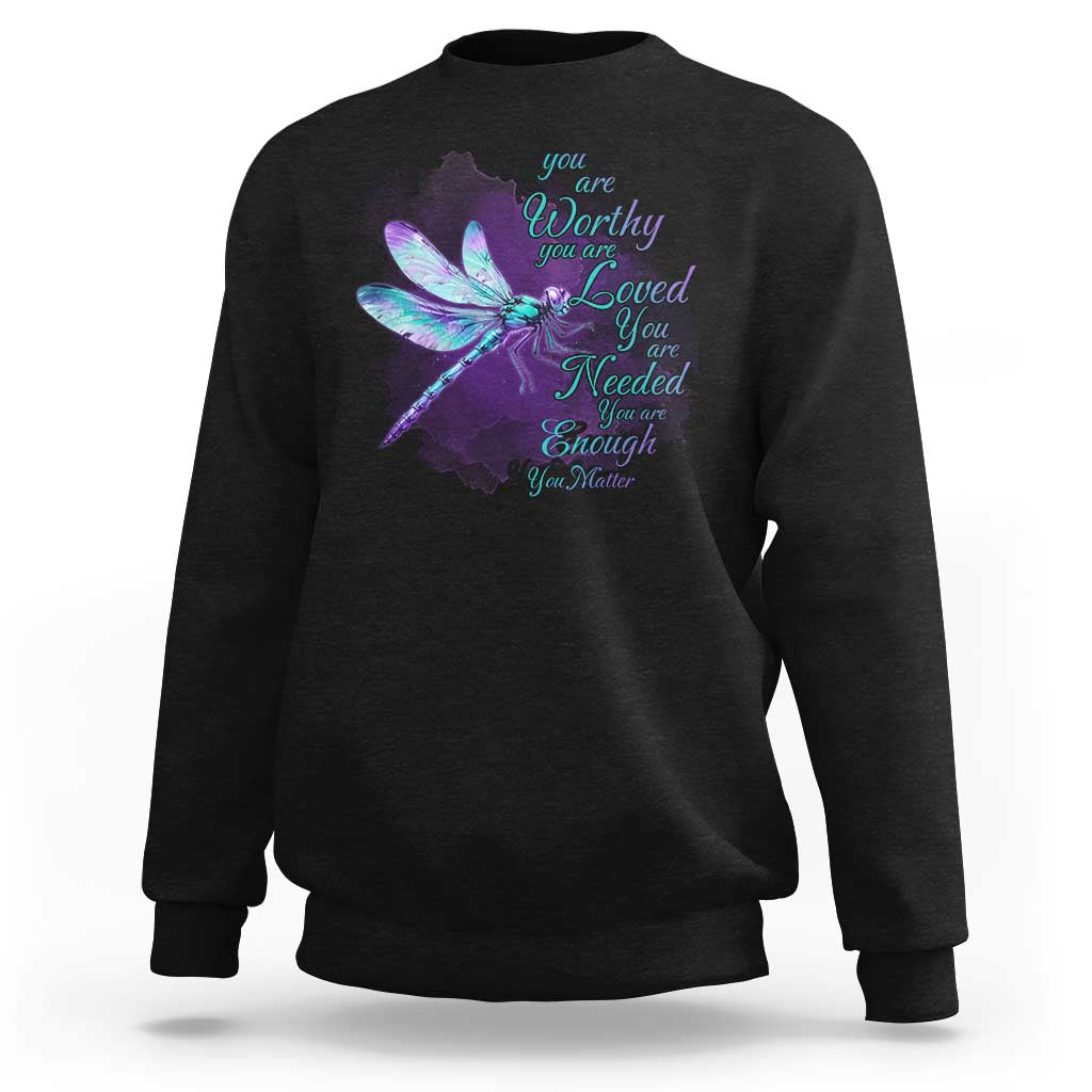 Black crewneck sweatshirt with colorful dragonfly and uplifting quote graphic