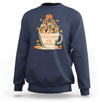 Navy teacher sweatshirt with pumpkin reading and books graphic, crew neck