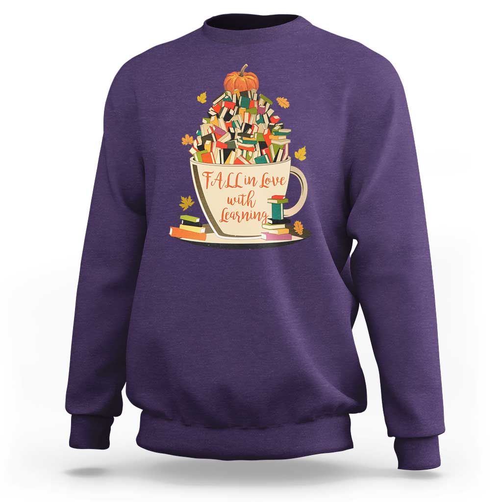 Purple teacher sweatshirt with pumpkin reading and books graphic, crew neck