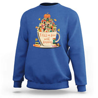 Royal blue teacher sweatshirt with pumpkin reading and books graphic, crew neck