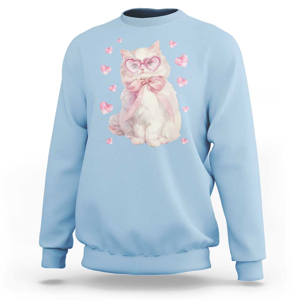 Light blue cat sweatshirt with heart glasses and pink heart print at chest