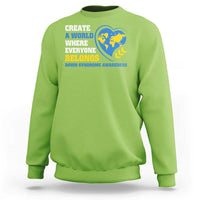 Lime green sweatshirt with "Create a world where everyone belongs" globe heart graphic
