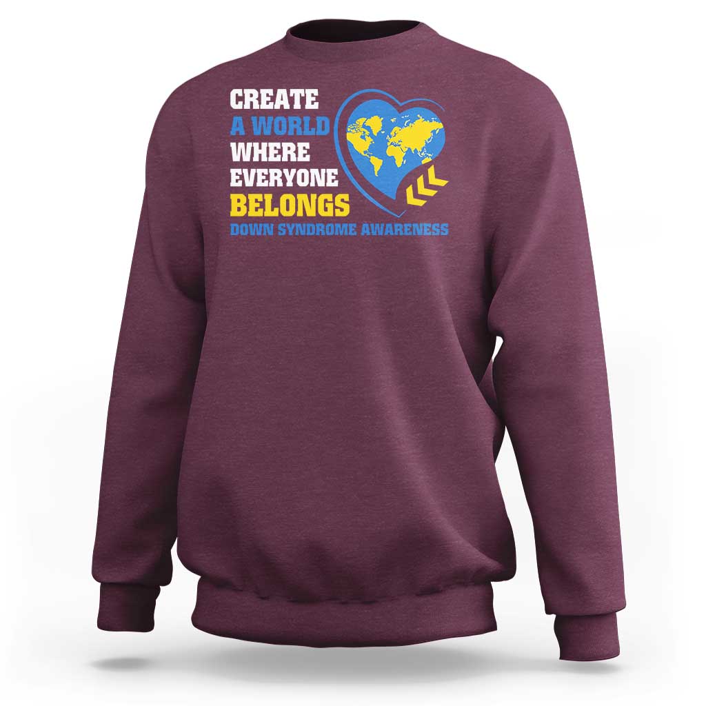 Maroon sweatshirt with "Create a world where everyone belongs" globe heart graphic