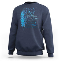 Navy crewneck sweatshirt with blue feather awareness graphic on back